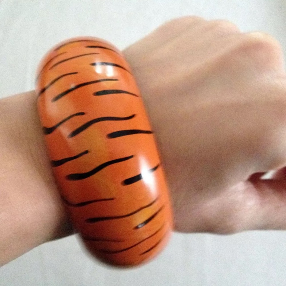 Tiger print painted vintage bangle bracelet orange flinstone pebbles bam bam